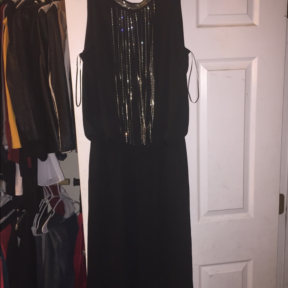 Black jumpsuit with attached necklace